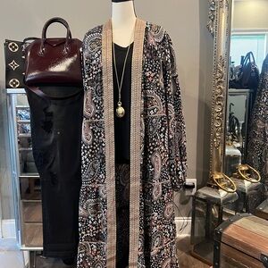 This new long kimono is great for any season  the design is amazing